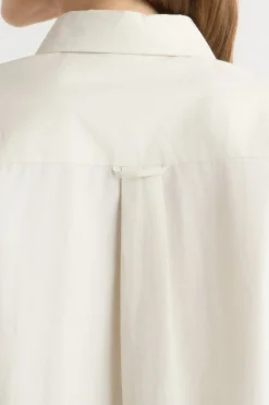 Hua Jia Phoebe Side-Button Tulip-Hem Shirt< Tops